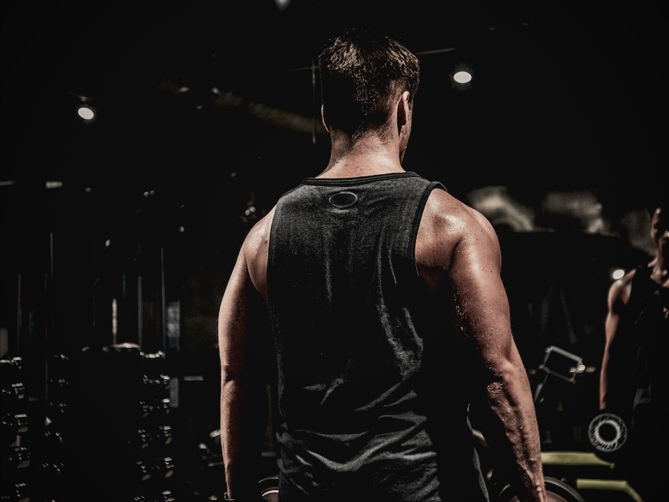 Lifter between sets in a dark gym